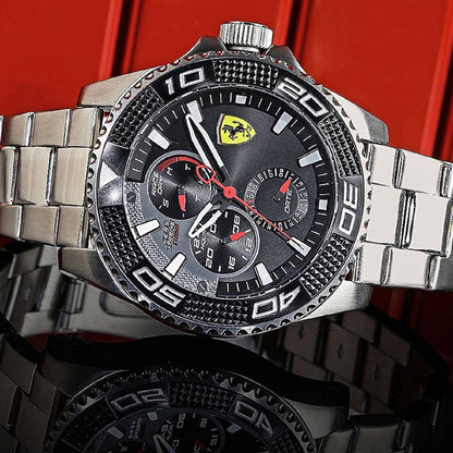Scuderia Ferrari Men Black & Grey KERS Xtreme Analogue Watch (Model 0830470), featuring a textured black dial, multifunction sub-dials, and a silver-toned stainless steel bracelet.